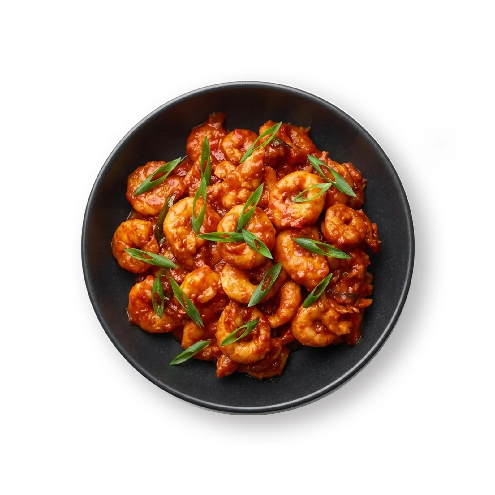 Spicy prawn masala served in a black bowl with fresh scallion garnish at the best restaurant in Islamabad.