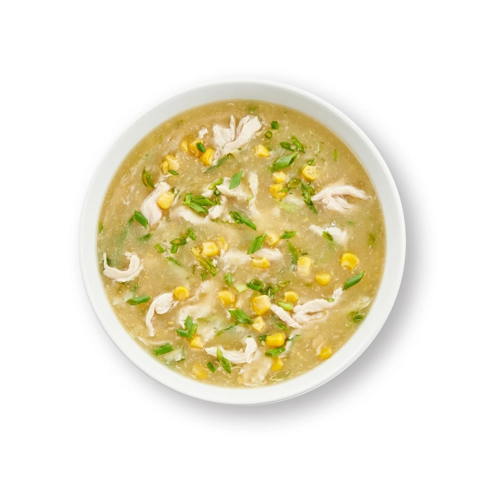 Chicken corn soup topped with sweet corn, shredded chicken, and fresh green onions served in a white bowl.